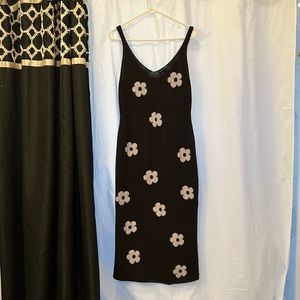 Divided Black Dress with White Floral Pattern
